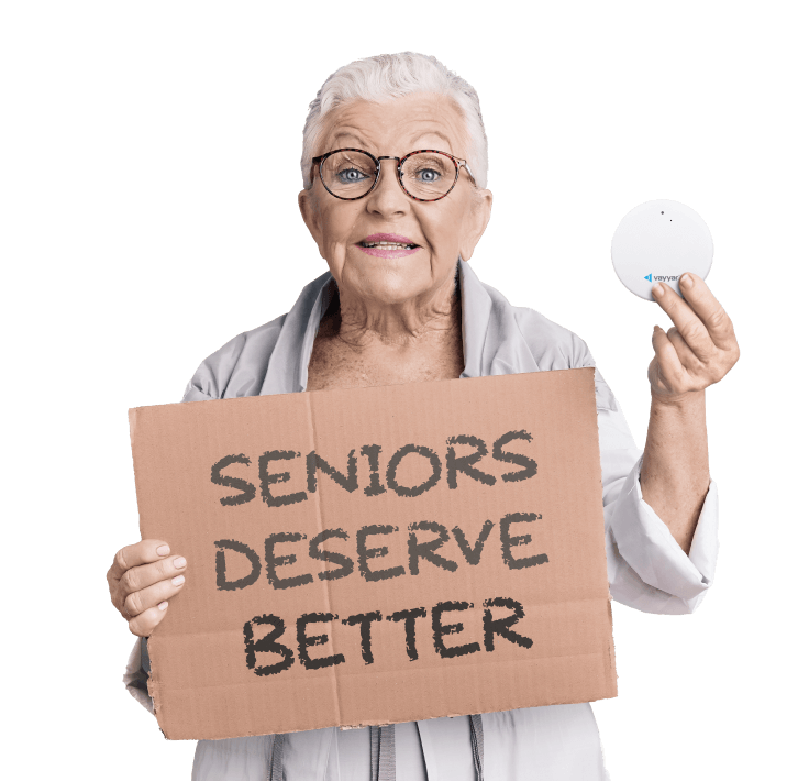 senior woman holding VayyarCare device and sign that says "Seniors deserve better"